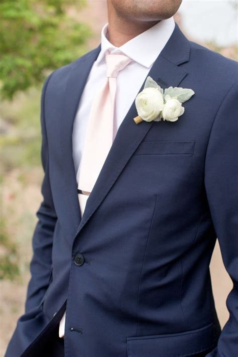 navy suit ivory tie.